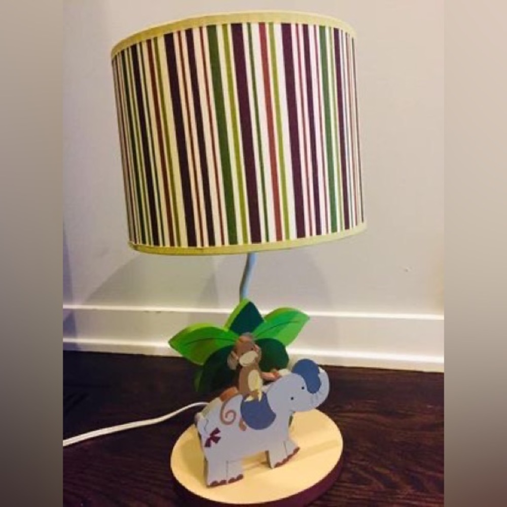Sweet light fixture w animal merry-go-round & striped shade - great for nursery.